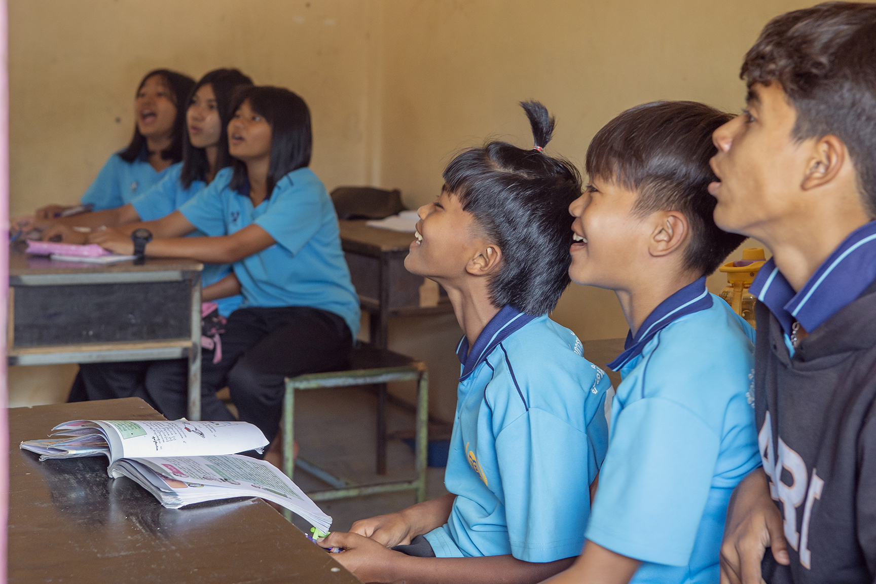 Migrant students studying at ACME